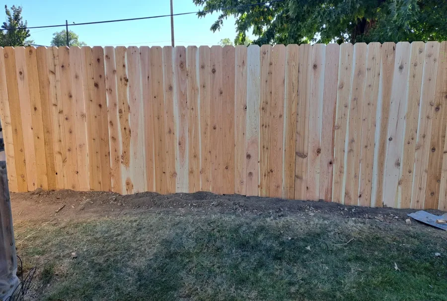 Dog eared cedar privacy fence in the Treasure Valley