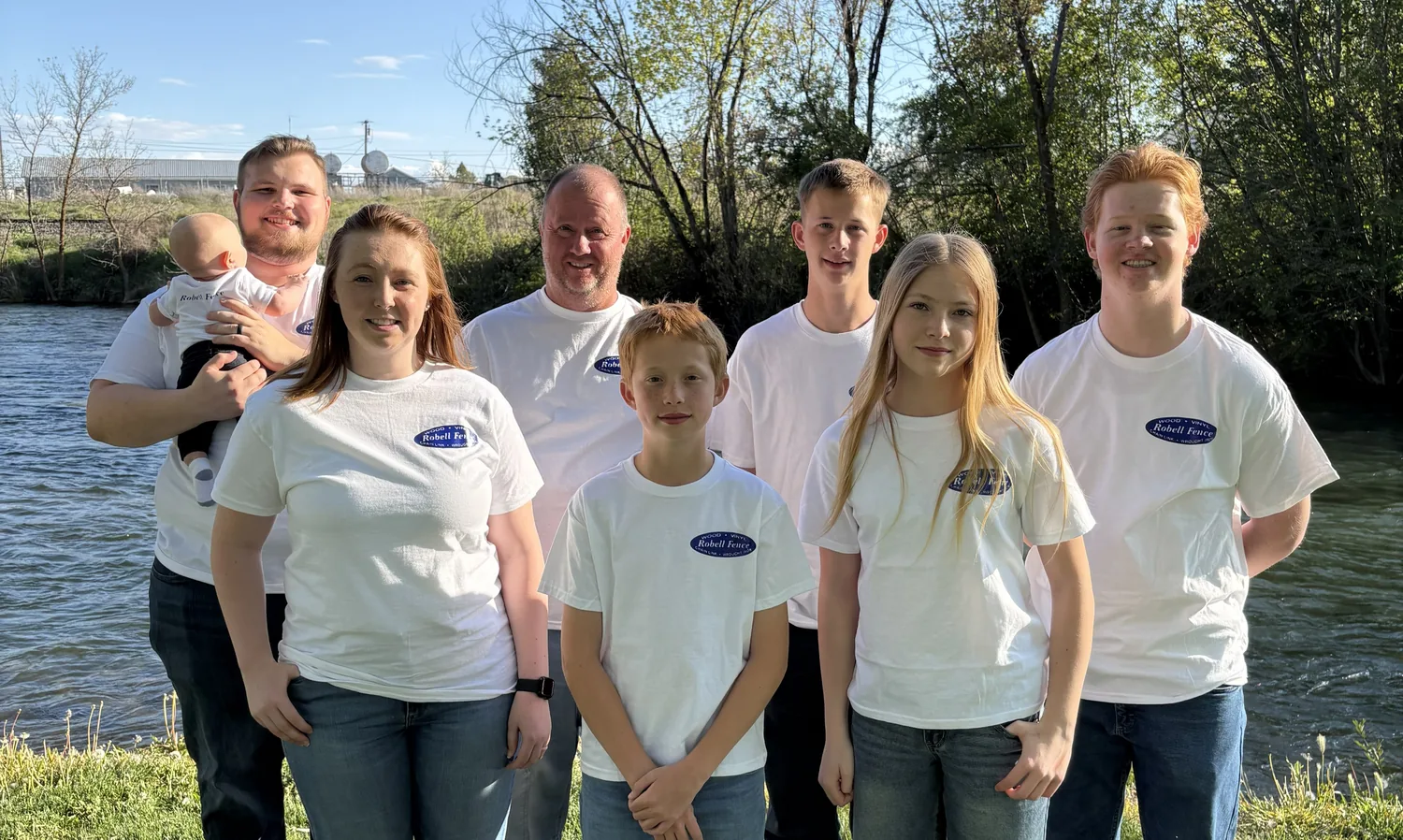 The Robell Fence family team together along the river in Kuna, Idaho