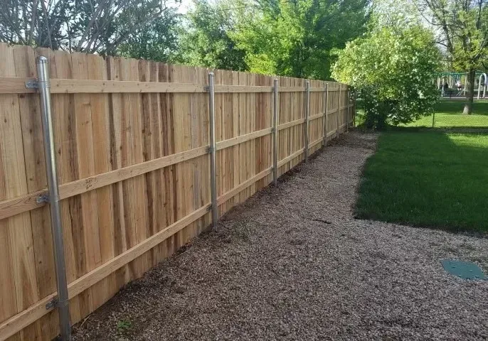Three rail cedar fence across an Idaho pasture line